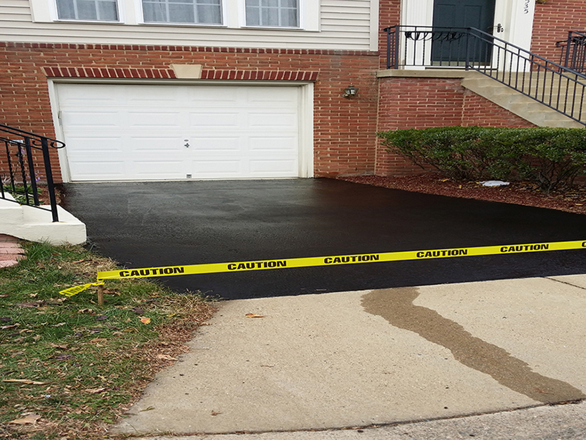 Setting barricade in front of driveway